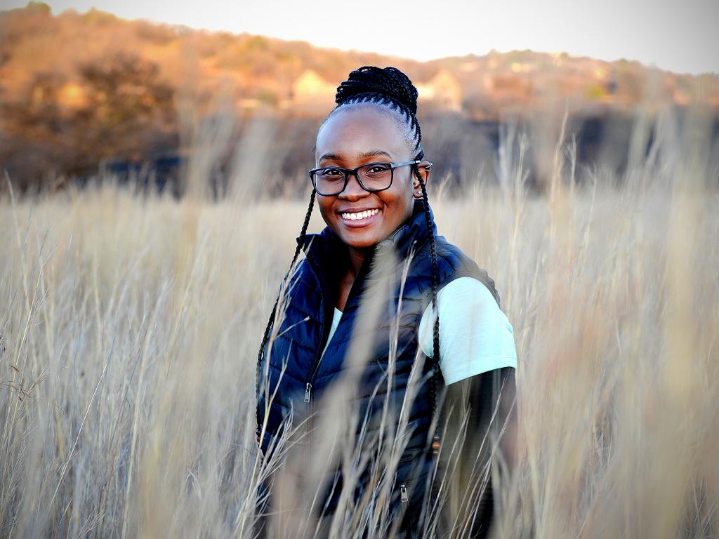 Person standing in a field